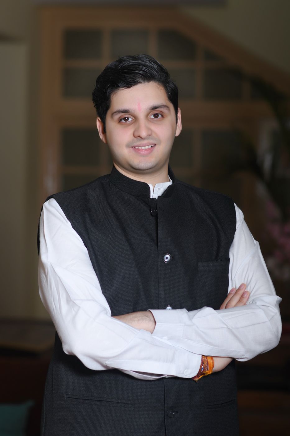 Portrait of Madhavraje Patwardhan in a black Nehru jacket