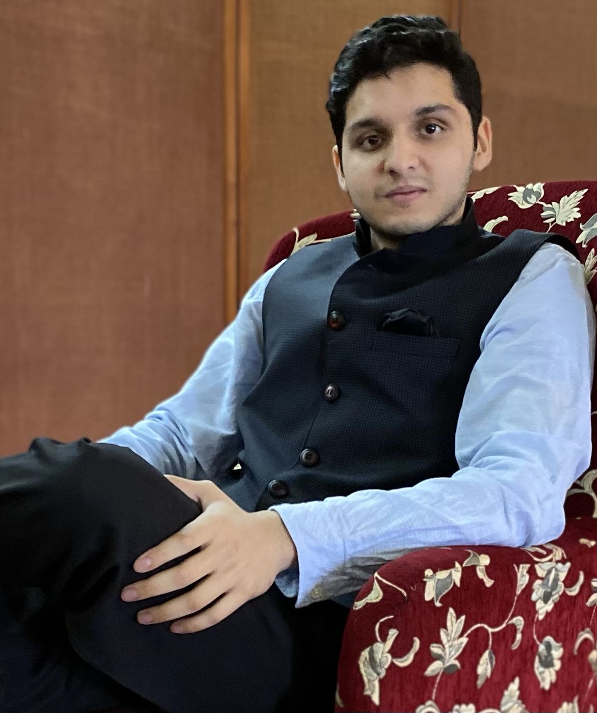 Seated portrait in a navy bandhgala